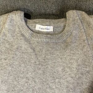 Calvin Klein sweater one piece with an attached cape. Warm and cozy Pretty grey